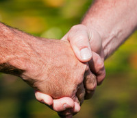 Image of a handshake symbolizing a fitness collaboration.