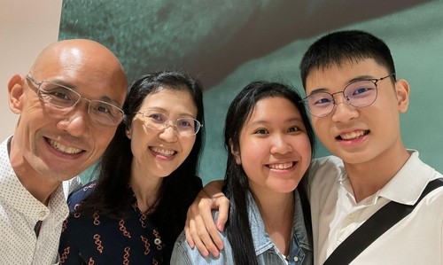 Photo of Rick Wong with his family.