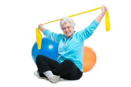 Image of a senior lady exercising with bands.