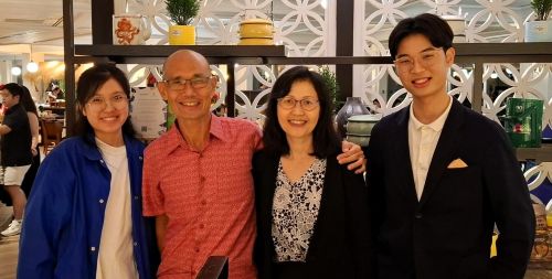 Image of Rick Wong with family.